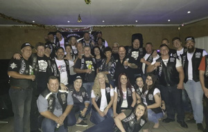 Members of the Immortal Guardians Motorcycle Club at the West End Chapter Patching